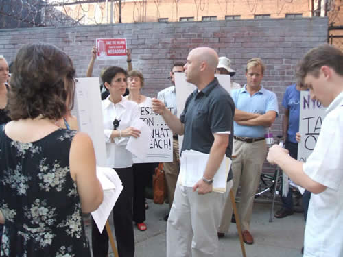 Andrew Berman speaking to protesters at rally against proposed NYU Dorm