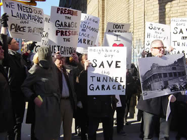 demonstrators in front of tunnel garage